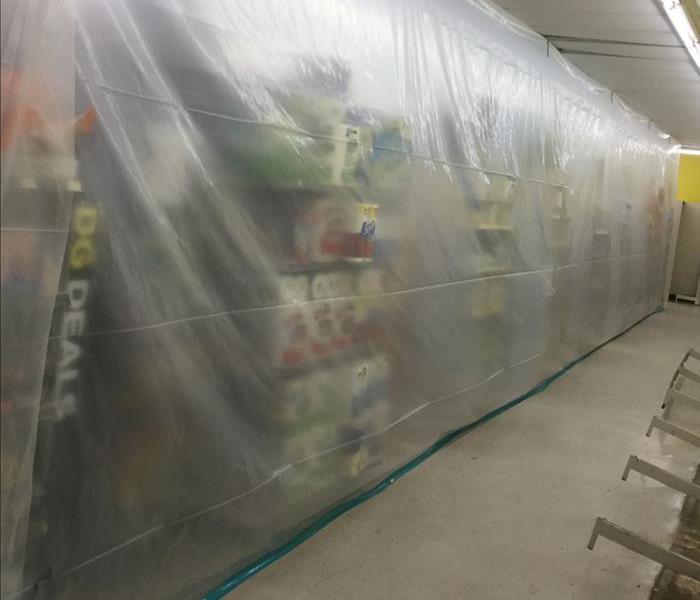 Plastic covering shelving in a commercial building