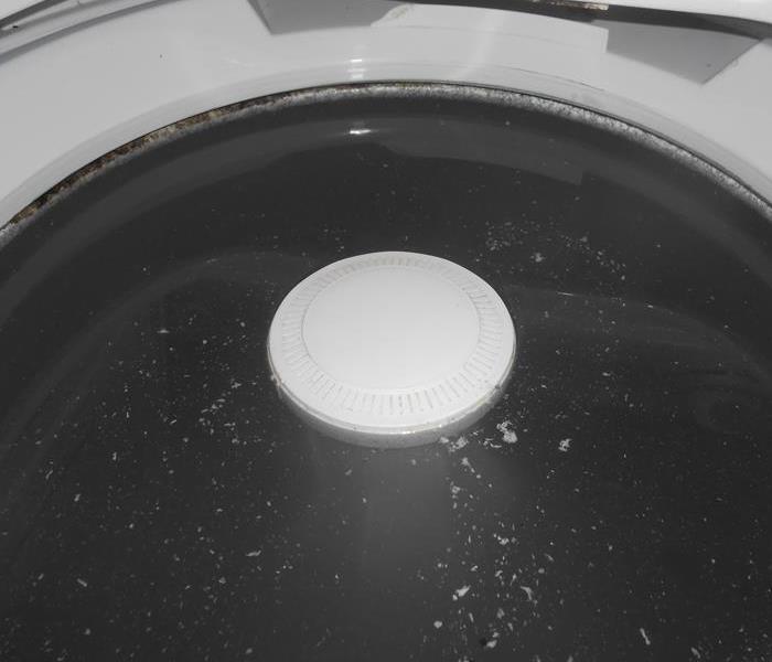 Washing machine with water filled to the top