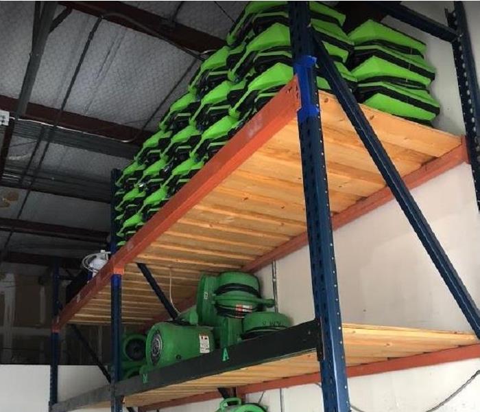 SERVPRO drying equipment stacked inside of storage facility