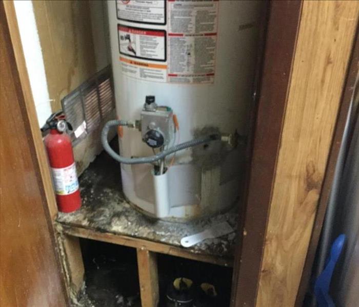 mold at hot water leak closet