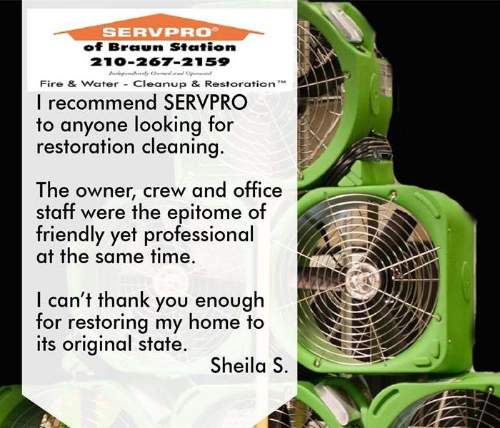 SERVPRO review next to green air movers