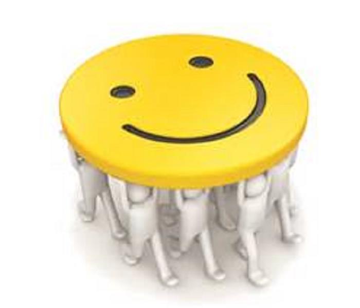 Smiley face being carried by white computer graphics people
