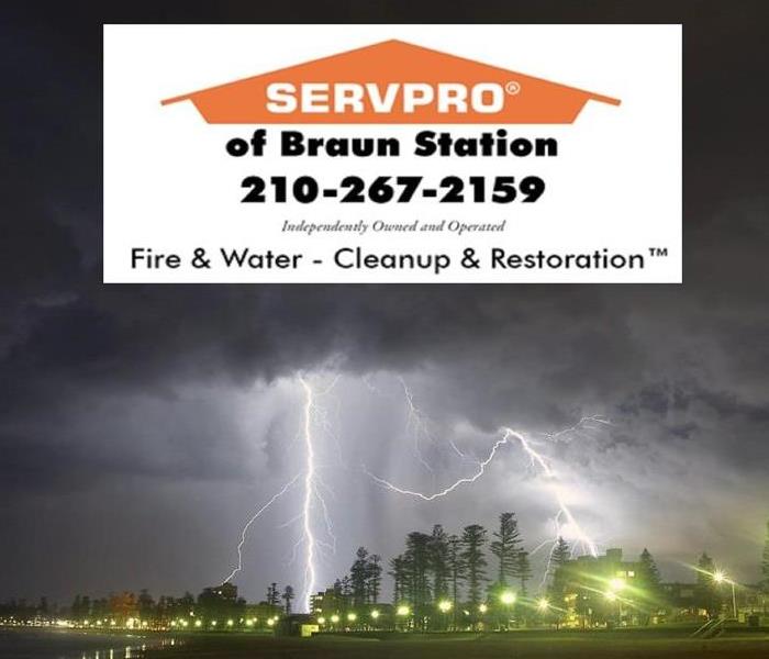 SERVPRO of Braun Station logo with phone number on top with lightening striking trees on the bottom on the picture