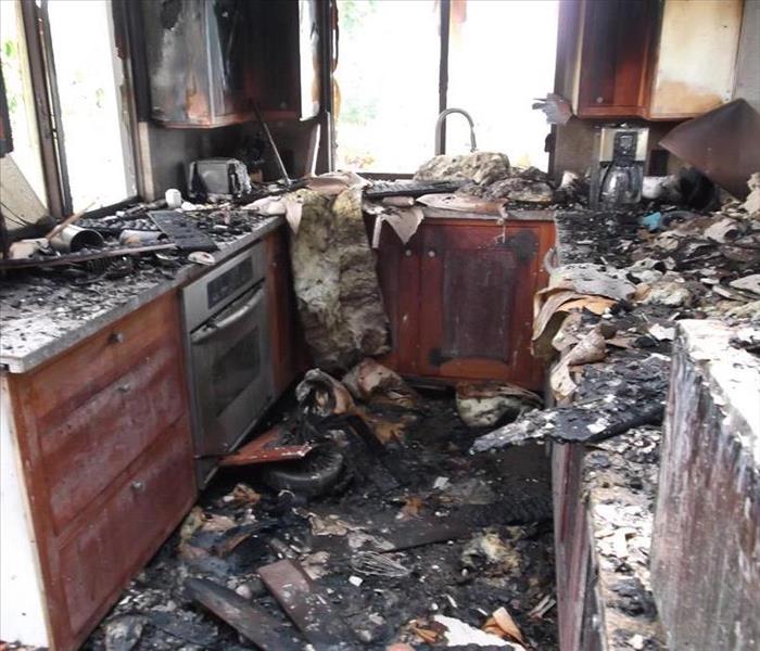 Severely fire damaged kitchen
