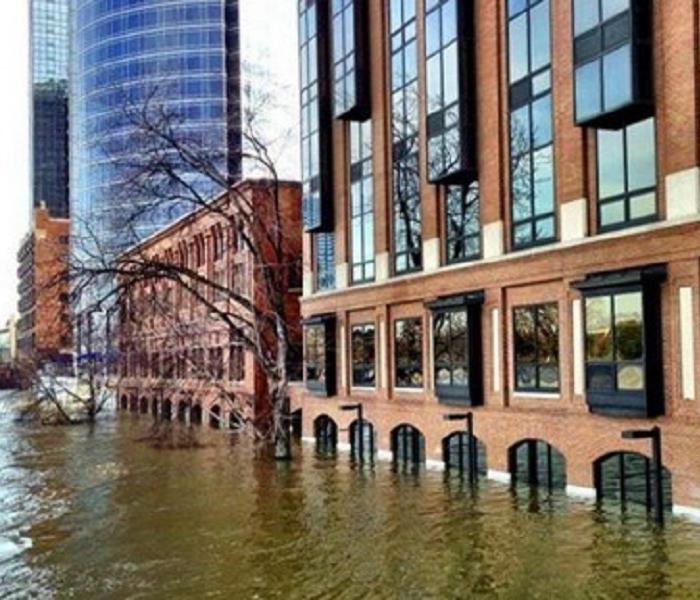 Commercial buildings surrounded by flood waters